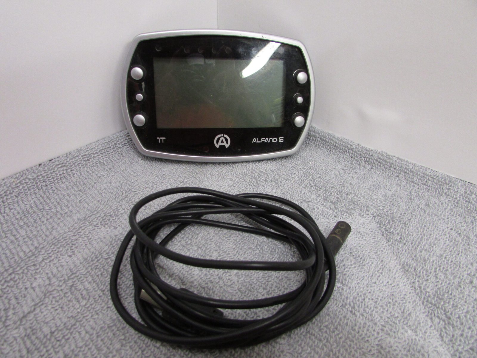 IMG_6544 Used Alfano 6 T1 w/charging Cable - Image 1